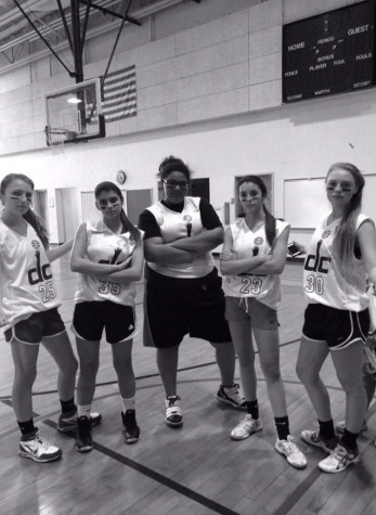 Girls Bowling members pose for a picture after regular season victory.