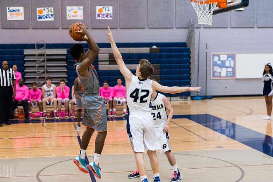 Senior Evan Schadelbauer prepares for a rebound. 