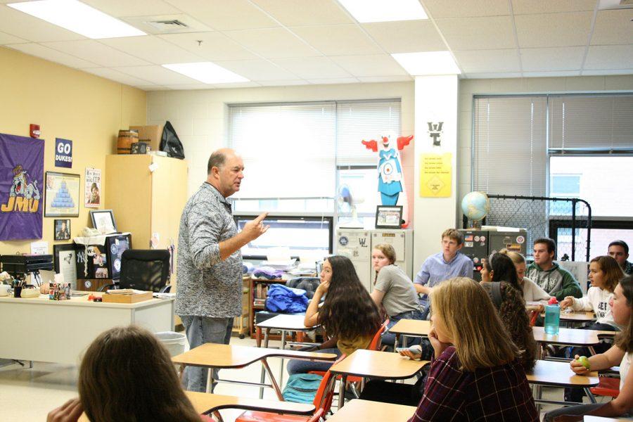 Mr. Doug Grove gives a lecture to third period IB Psych students. 