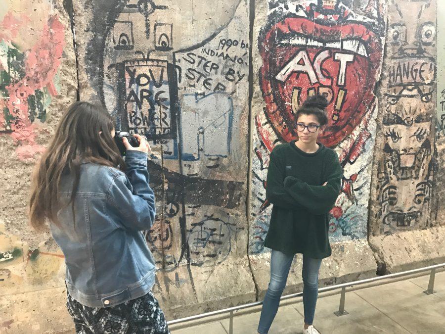 Sophomore Natalia Paley-Whitman takes a picture of sophomore Jessica Beyers in front of the historic Berlin Wall.