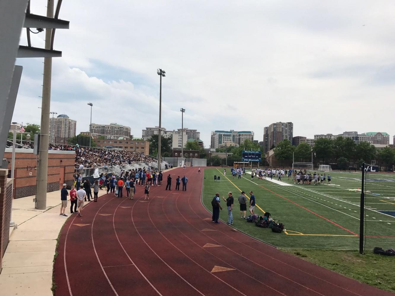 Students wait in the stands for the SCA Olympics to begin.