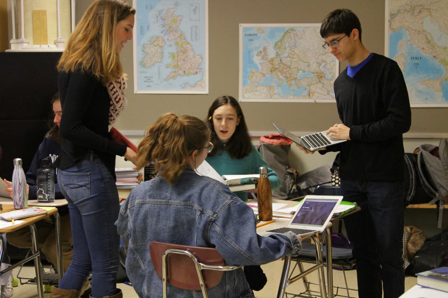 Image courtesy of Victor ONeill Studios.

Sophomores Draken Garfinkel, Lily De Benigno, Julia Billera and Reilly Halvorson work in Latin class.