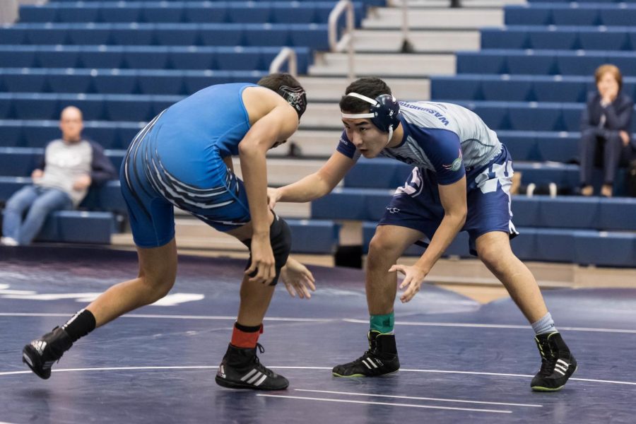 Senior Temmulen Jargalsaikhan focuses on pinning his opponent