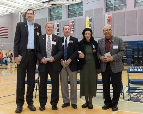 The inductees were honored during in between the girls' and boys' varsity basketball games on Friday, January 19.