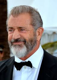 Mel Gibson smiles in a recent red carpet appearance.