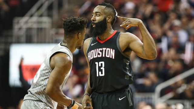 Apr 15, 2018; Houston, TX, USA; Houston Rockets guard James Harden (13) celebrates after scoring as Minnesota Timberwolves guard Jimmy Butler (23) loos on  during the first quarter against the in game one of the first round of the 2018 NBA Playoffs at Toyota Center. Mandatory Credit: Troy Taormina-USA TODAY Sports