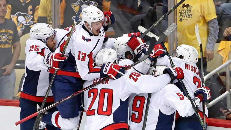 The Caps celebrate after defeating the Penguins  in Game 6 of the Conference Semifinals.