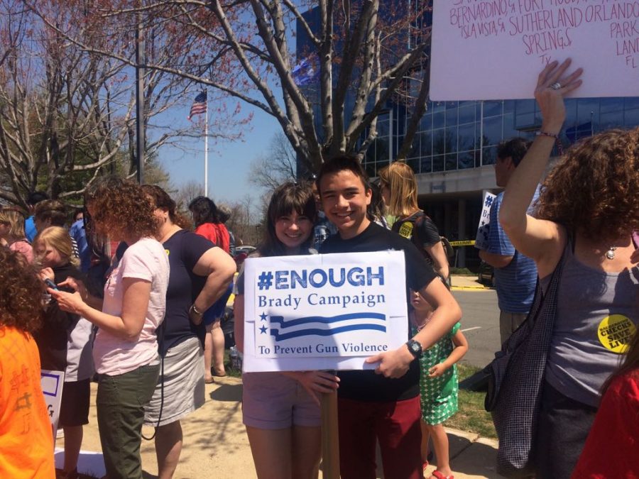 Sophomores Katie Brown and Ziad Kamil attend a protest against gun violence as part of the new Youth DIrect Club. The club offers many opportunities for students to get involved.