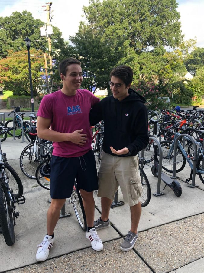 Juniors Noah Toth, right,  and Jack Mowry hang out around the bike racks. They are the organizers of the Bike for Cancer fundraiser.  
