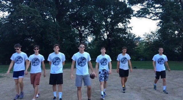 Seniors and club members (Left to right) Liam O’casey, Wyatt Biddle, Colin Harrison, Peter Jude Bardo, Joe Main, Roman Dangel, and Zach Meiners prepare for a friday afternoon of flag football, sporting their new club shirts. 
