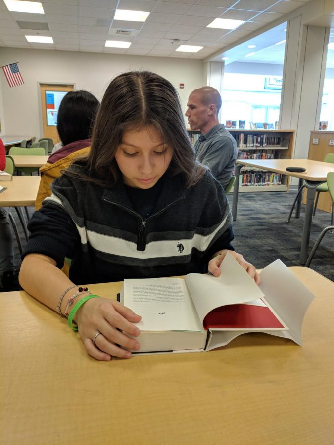 Freshman Emely Interiand begins reading “The Hate U Give”. The book was made into a movie and released on October 5 of this year.	