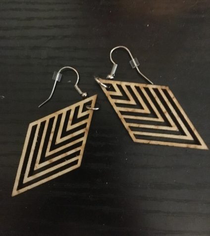 Earrings that a student bought from the fundraiser. They are handmade and one of eight different unique styles. 