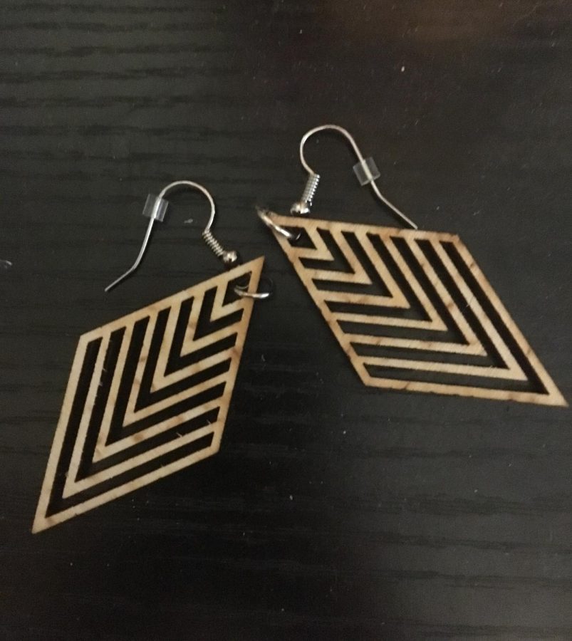 Earrings that a student bought from the fundraiser. They are handmade and one of eight different unique styles. 