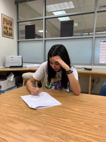 Junior Holland Forsythe works on a math test.