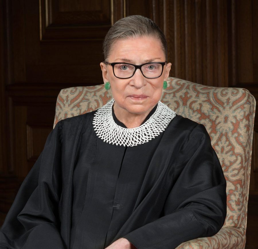 Supreme Court Justice Ruth Bader Ginsburg wearing her favorite collar. She often wears her collars to express her views and has different ones for majority and dissenting opinion.