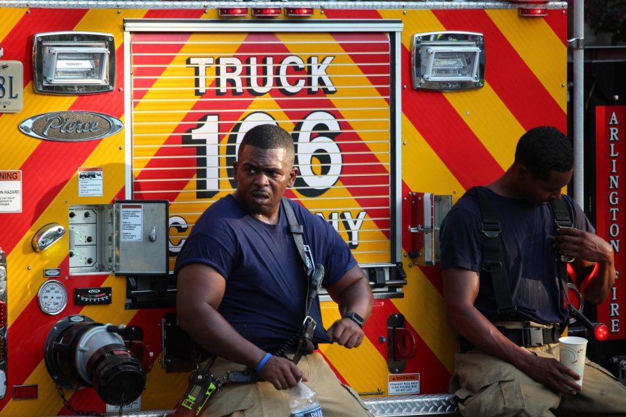 Firefighter%2FEMTs+Everette+Thomas+and+Brandon+Newby+take+a+moment+to+recuperate+after+responding+to+a+house+fire+in+Arlington+County.+At+every+call%2C+firefighters+must+be+careful+to+stay+safe+and+in+good+health+while+helping+the+community+with+whatever+incident+has+taken+place.+