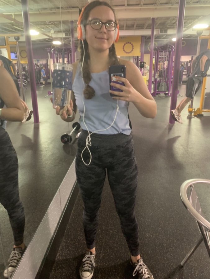 Senior Lucy Pappa snaps a picture of herself at Planet Fitness. Pappa is apart of Planet Fitness’ summer teen program. 

