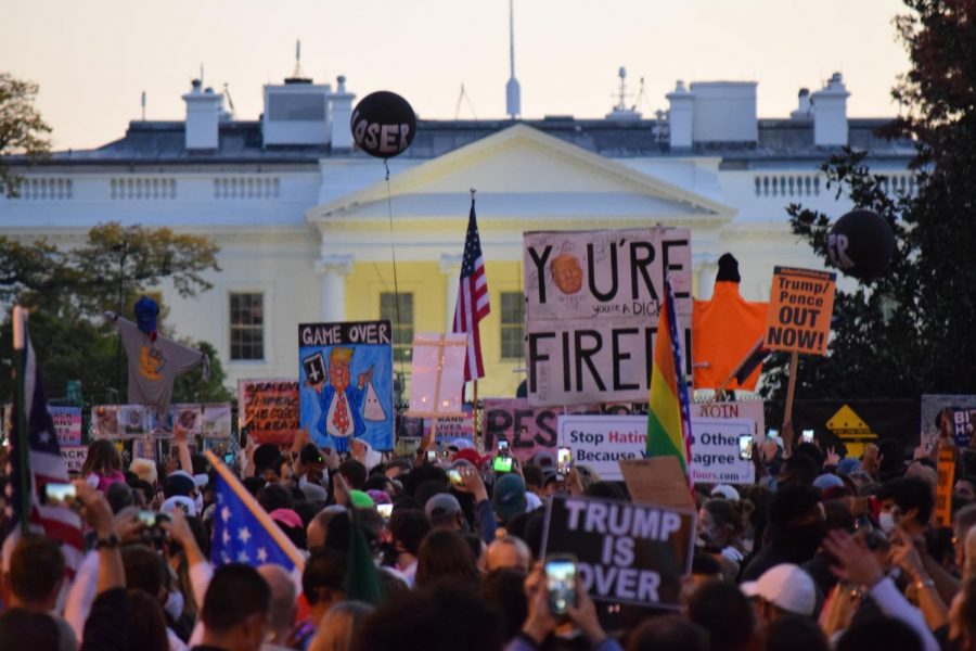 Residents of Washington, D.C. gather in front of the White House to celebrate Joseph Bidens win in the 2020 General Election. Before the election, several of the schools students participated in get-out-the-vote campaigns.