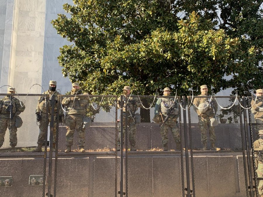 The National Guard watches over President Bidens inauguration. The event was monitored by over 20,000 National Guard members and only a limited number of people were able to attend. 