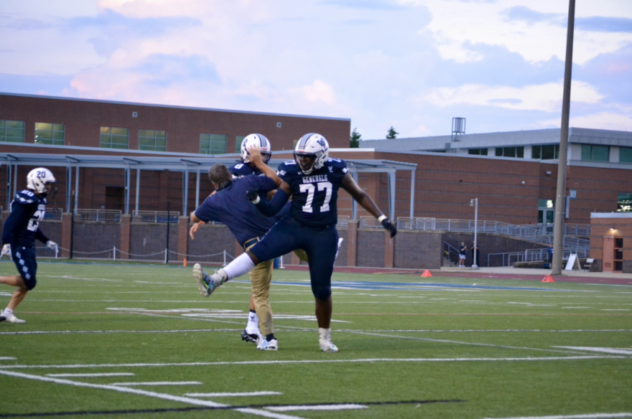 Coach Shapiro bodies teammates in celebration