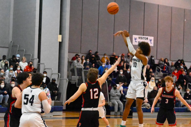 Senior Jahki Beale taking a shot late in the fourth  quarter against Madison in the regional semifinals.  