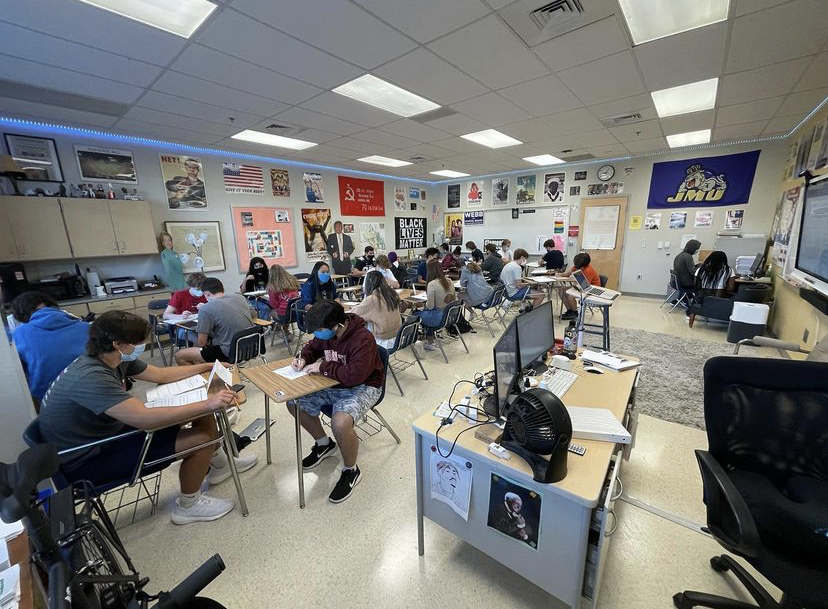 Mr. Phillips students work on projects during class time. After the virtual/hybrid year Mr. Phillips worked to engage  students in the lessons, a stark contrast from COVID-19 learning.   