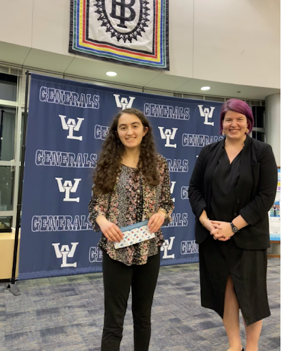 Klein advanced to a high level in Poetry Out Loud. She poses with teacher sponsor Cecelia Larsen after winning the school round of the competition. 

