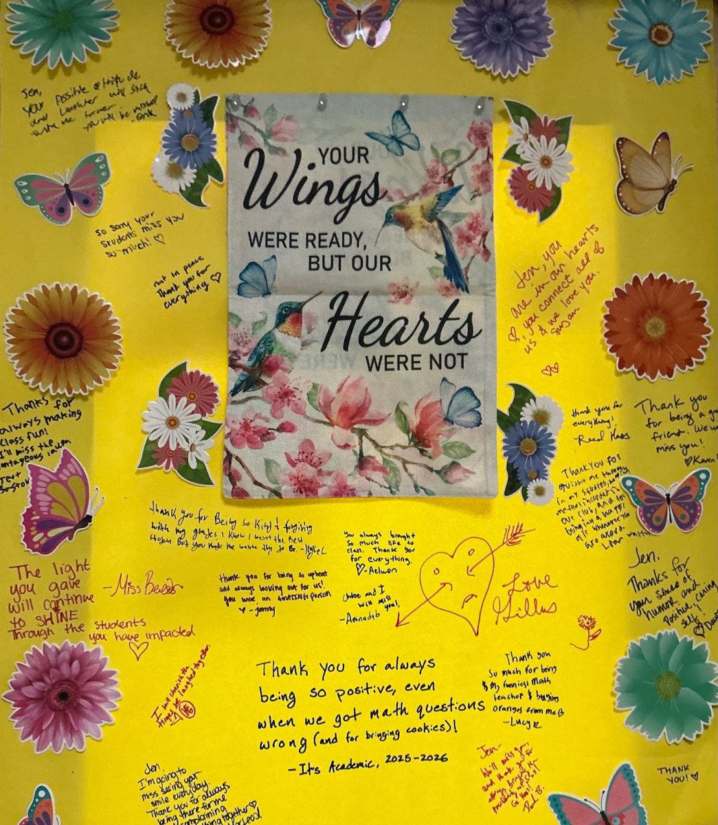 The outside of Ms. Scher’s classroom door. It is decorated with the signatures of members of the Washington and Liberty community. 